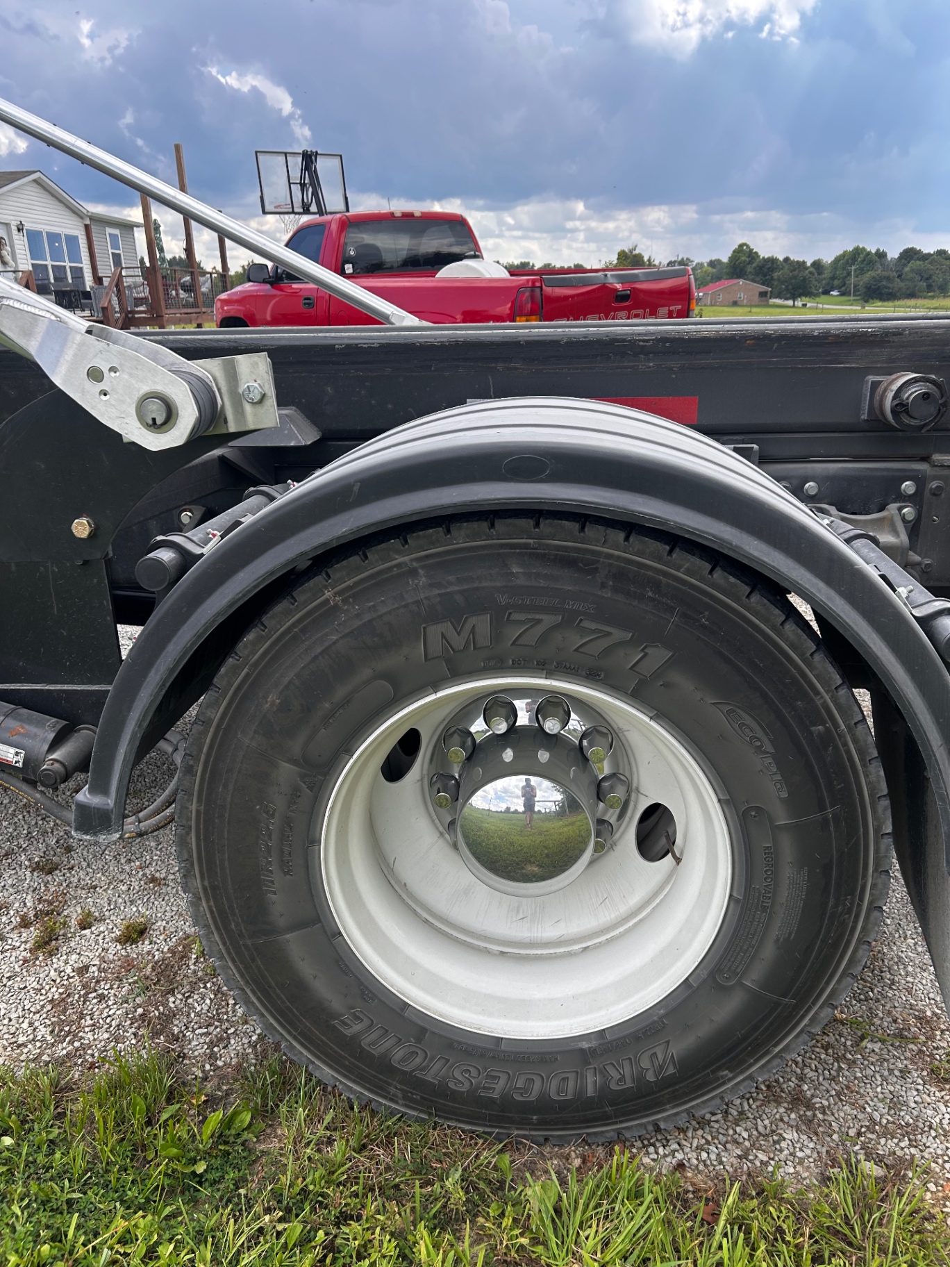 Cleaned truck tire and polished white steel wheel