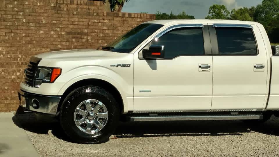 Clean white Ford F-150 after a full detail